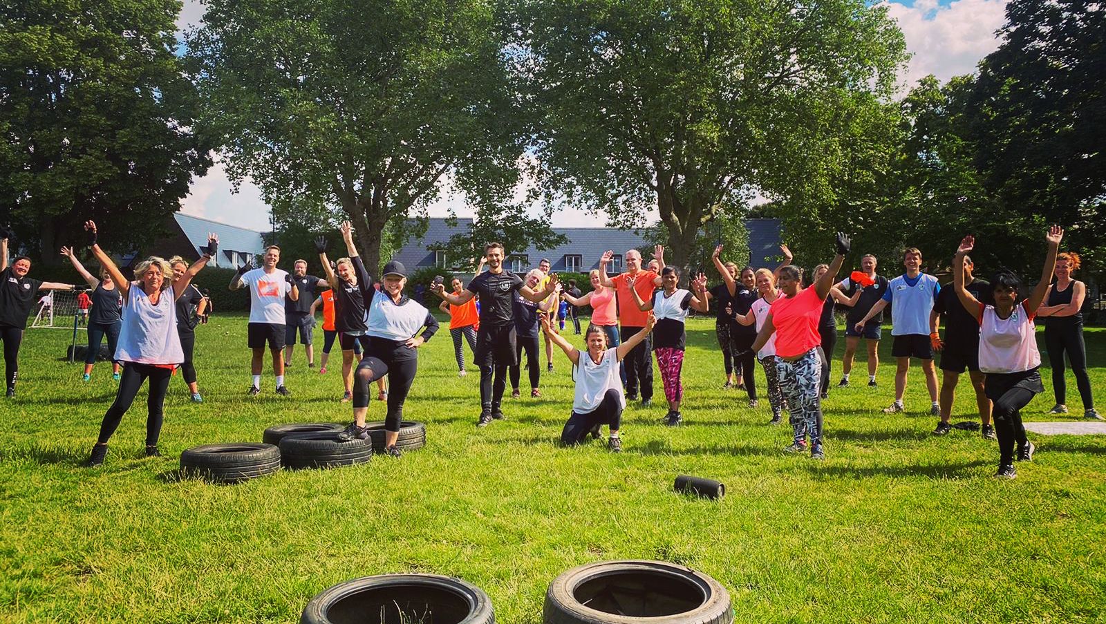 Challenge Bootcamp members training together outdoors in an Isleworth park